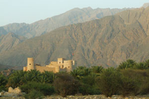 Nakhl fort, between the palm grove and the Western Hajar mountains.